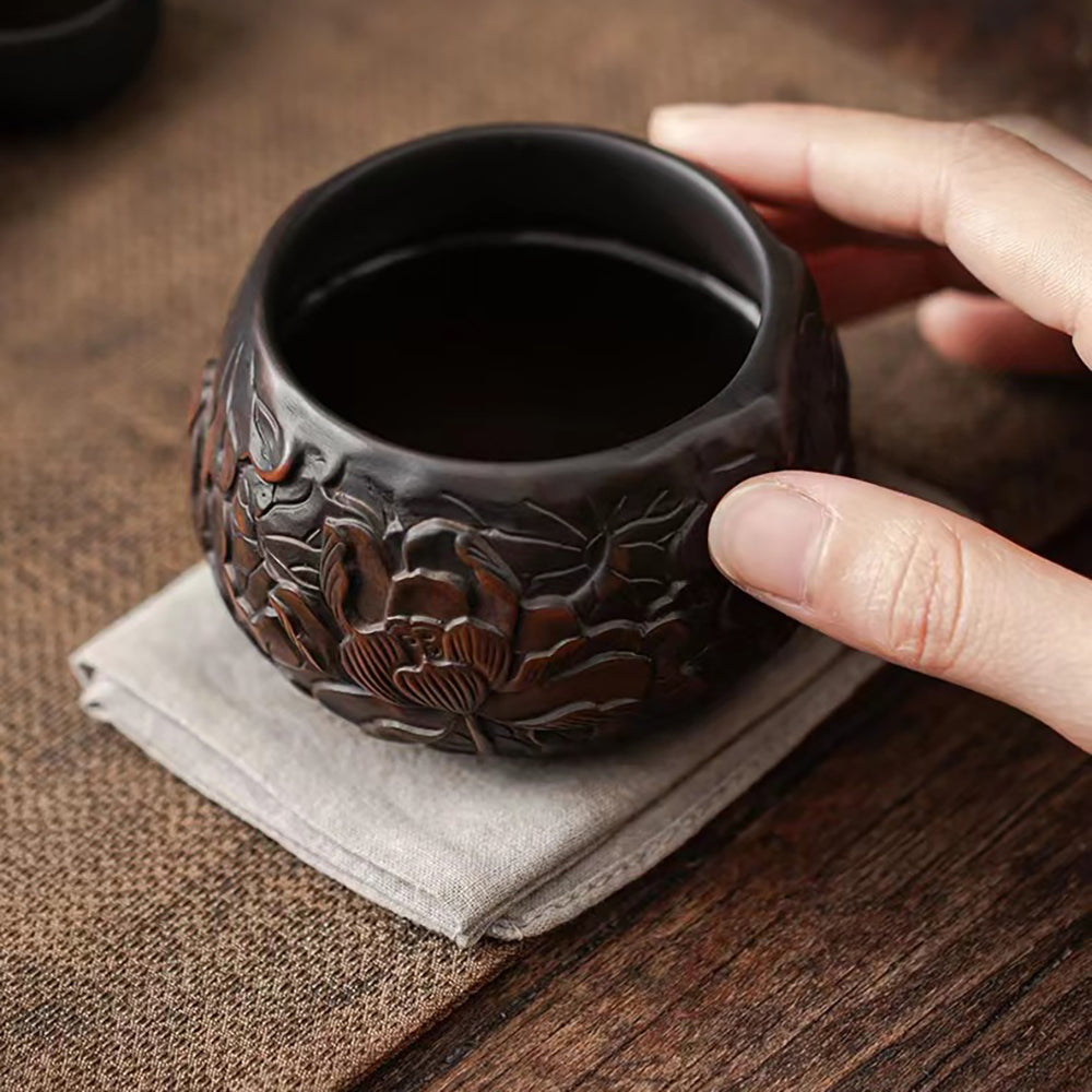 Black Pottery Relief Lotus Kung Fu Tea Cup