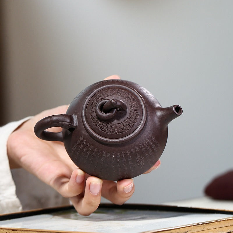 宜兴紫砂三足壶