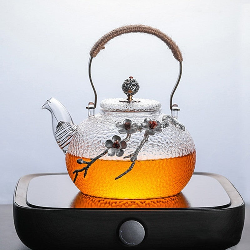 玻璃茶壶与锡梅